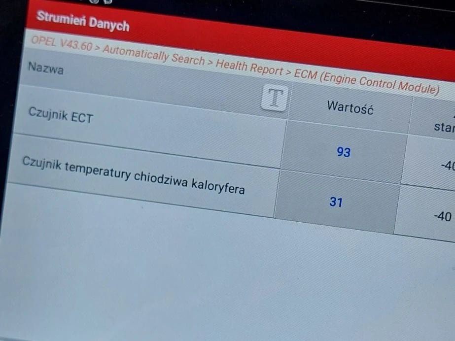 Odczyt czujnika temperatury płynu chłodzącego w Oplu 1.4 Turbo na testerze diagnostycznym